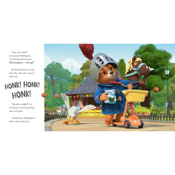 A printed book or booklet page featuring a colorful illustration of Paddington Bear riding a orange scooter in a park, with a white bird in front and another character behind. The left side includes printed text and quotes on a white background.