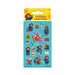 Paddington-themed sticker sheet package with multiple illustrated stickers on a turquoise backing card, including Paddington Bear, balloons, a suitcase, and small character scenes. The header reads 'Paddington 6 Sheets of Stickers' with a yellow background.