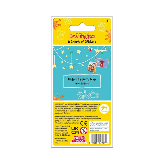 Packaged Paddington-themed party stickers on a yellow and blue card backing, with a hanging tab at the top and product text including '6 Sheets of Stickers' and 'Perfect for party bags and treats.'.