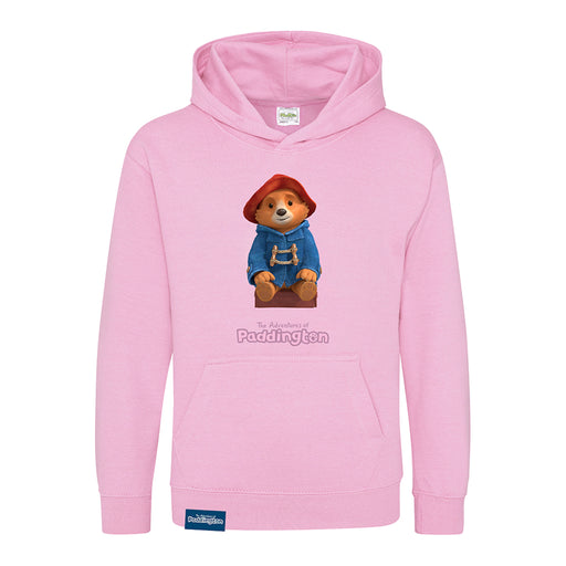 A pink kids hoodie with a graphic of Paddington bear wearing a blue jacket and a red hat.