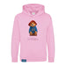 A pink kids hoodie with a graphic of Paddington bear wearing a blue jacket and a red hat.