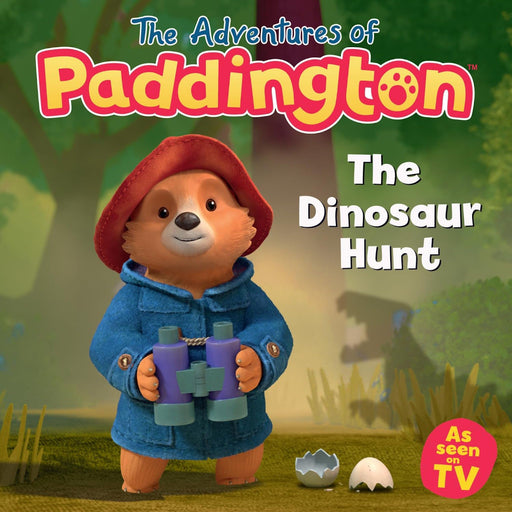 Cover of the children's book 'Paddington TV: The Dinosaur Hunt' featuring an illustration of Paddington Bear with a red hat and blue coat, holding binoculars, with dinosaur eggs at his feet.