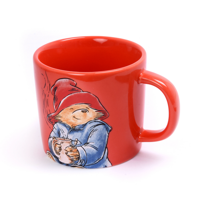 Red Paddington bear mug with a character design on a white background