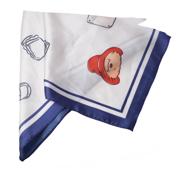 White scarf with navy blue border featuring cartoon Paddington bear character and marmalade sandwich  design on a white background