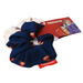 Set of 2 scrunchies with Paddington Bear design on a white background. One navy blue and the other is white