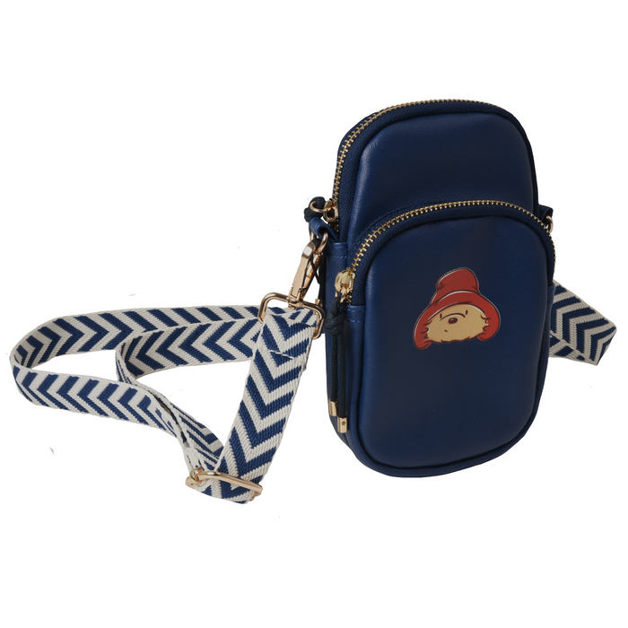 Navy blue crossbody bag with a Paddington bear character design and a matching strap on a white background