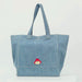 Paddington P.B. Collection oversized denim tote bag with shoulder straps, spacious interior and Paddington detailing shown in close-up.