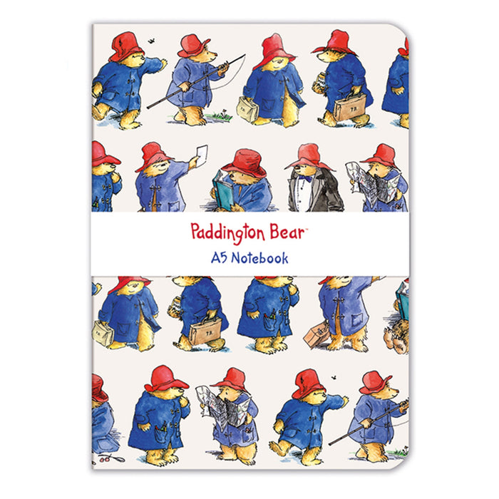 A Paddington Bear themed A5 notebook with illustrations of the character in various outfits on the cover.