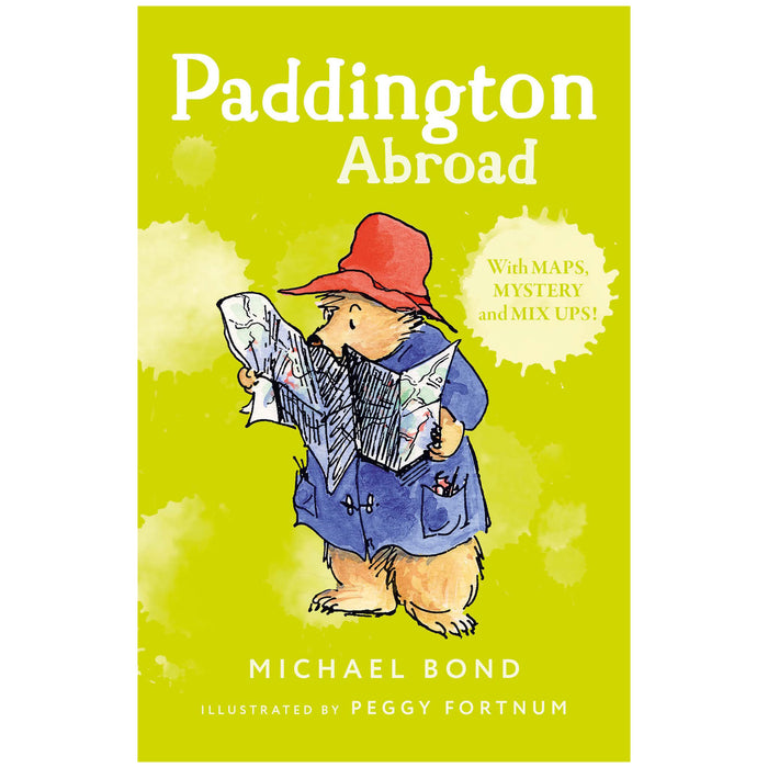 Book cover of 'Paddington Abroad' featuring an illustration of Paddington Bear wearing a hat and holding a map, against a green background.