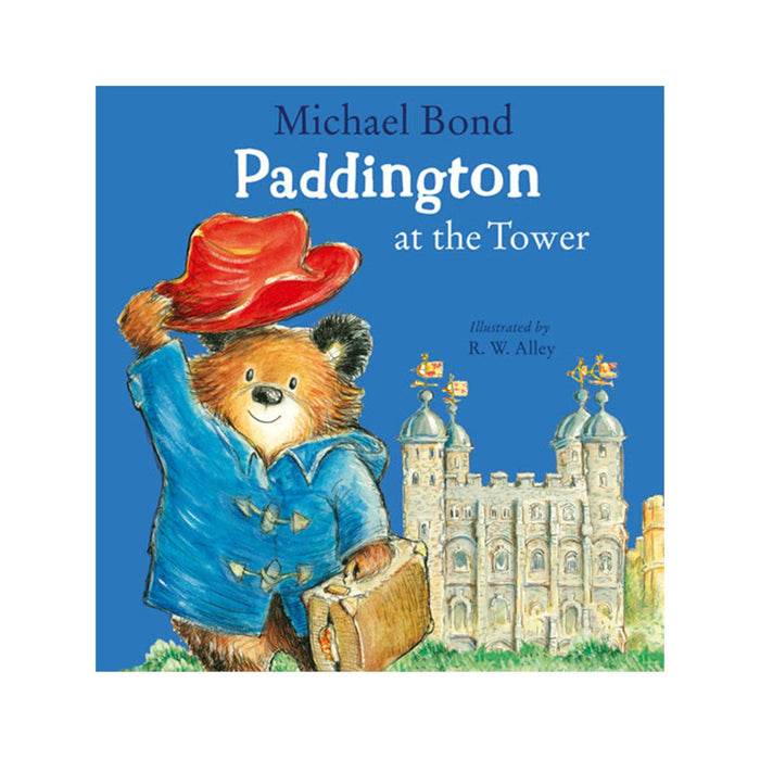 Book cover of 'Paddington at the Tower' featuring an illustration of Paddington bear wearing a red hat, with the Tower of London in the background.