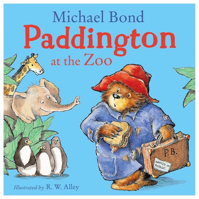 Book cover for 'Paddington at the Zoo' featuring an illustration of Paddington Bear wearing a red hat and a blue coat, holding a sandwich, with a variety of zoo animals looking on.