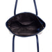Navy blue handbag with a white interior on a white background