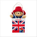 Paddington bear plush toy in a bag with a Union Jack design on a white background
