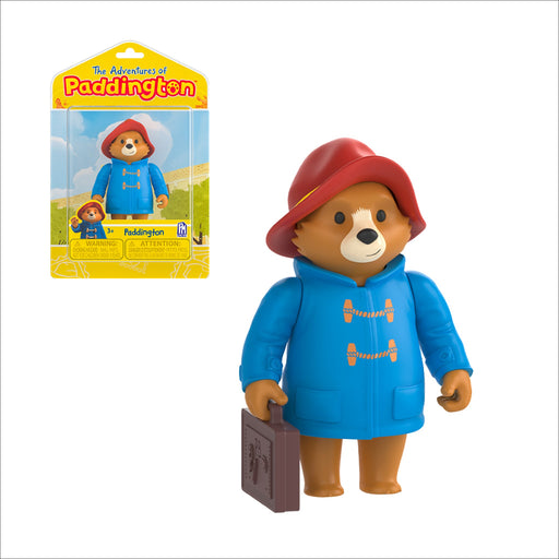 Paddington bear toy figure with blue coat and red hat, next to packaging