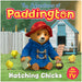 Book cover of 'The Adventures of Paddington: Hatching Chicks' with Paddington Bear and chicks in front of a wooden shed.