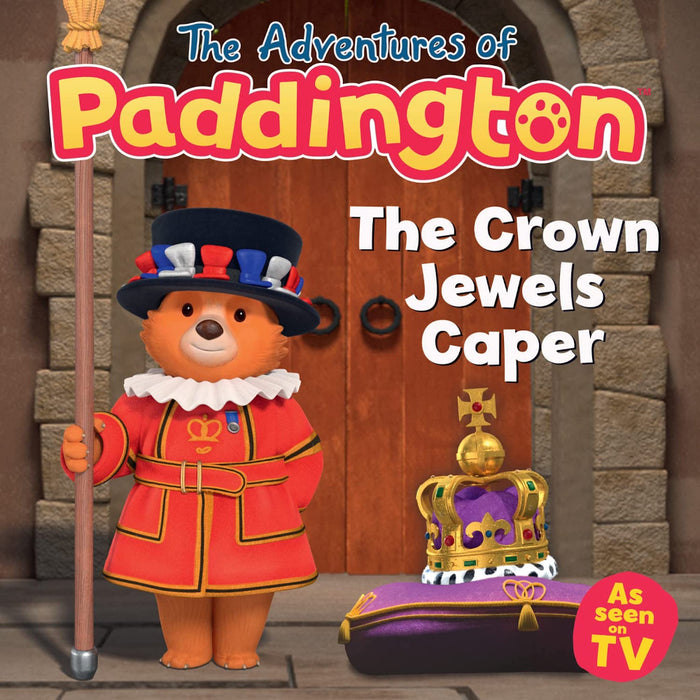 Cover of a Paddington Bear book titled 'The Crown Jewels Caper', showing Paddington Bear dressed as a Beefeater outside the Tower of London with the Crown Jewels in the foreground.